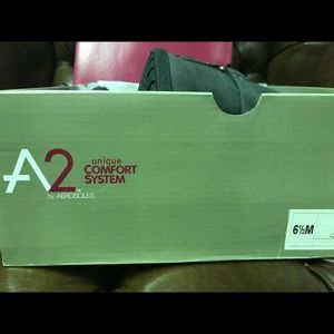 Aerolsoles knee high boots.